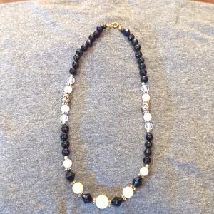 Women's black, pink and clear ball necklace.
